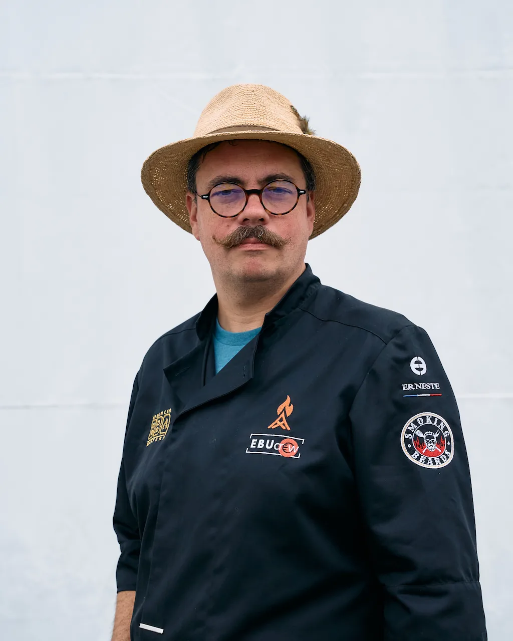 Portrait de Régis Calcus en veste de travail